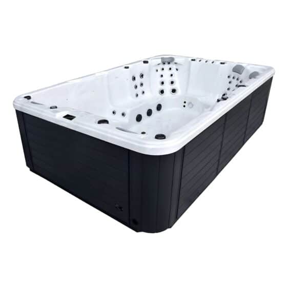 Le Spa 10 places D345 est un grand spa rectangulaire avec un intérieur blanc, des panneaux extérieurs noirs, de multiples jets et des sièges pour 10 personnes, représenté isolé sur fond blanc.