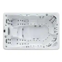 Vue de dessus du Spa 10 places D354, un grand jacuzzi rectangulaire blanc pouvant accueillir 10 personnes et doté de jets d'hydrothérapie intégrés pour la détente.