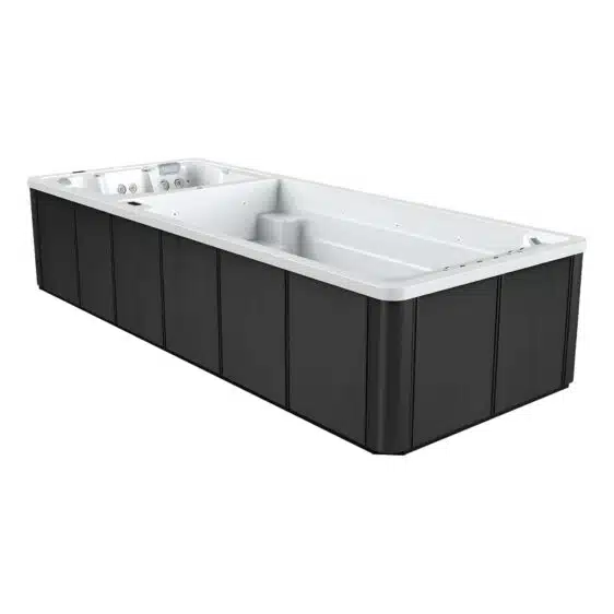 Le Spa de nage D590 est un spa de nage rectangulaire spacieux avec un intérieur blanc et des panneaux extérieurs foncés, offrant des sièges intégrés et plusieurs buses à jets pour une expérience relaxante.
